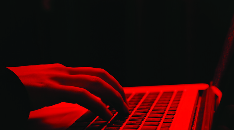 Red keyboard with hand